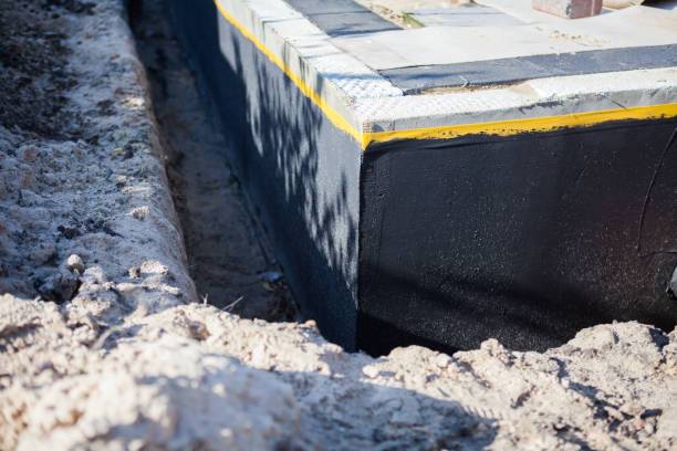 Professional Interior Drainage System technician working in Maplewood, WA